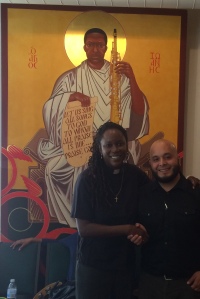 With Pastor Stephens and Saint John Coltrane in background.